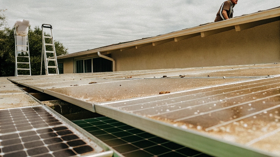 A clean solar panel array for a pool pump glistening in the sun.